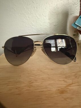 Prada Gold Frame Sunglasses with Dark Smoke Lenses